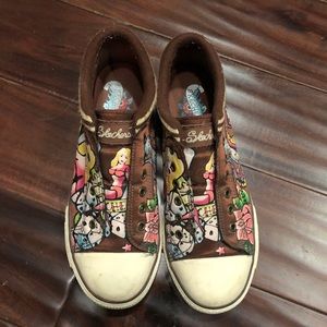 Brown sketchers shoes